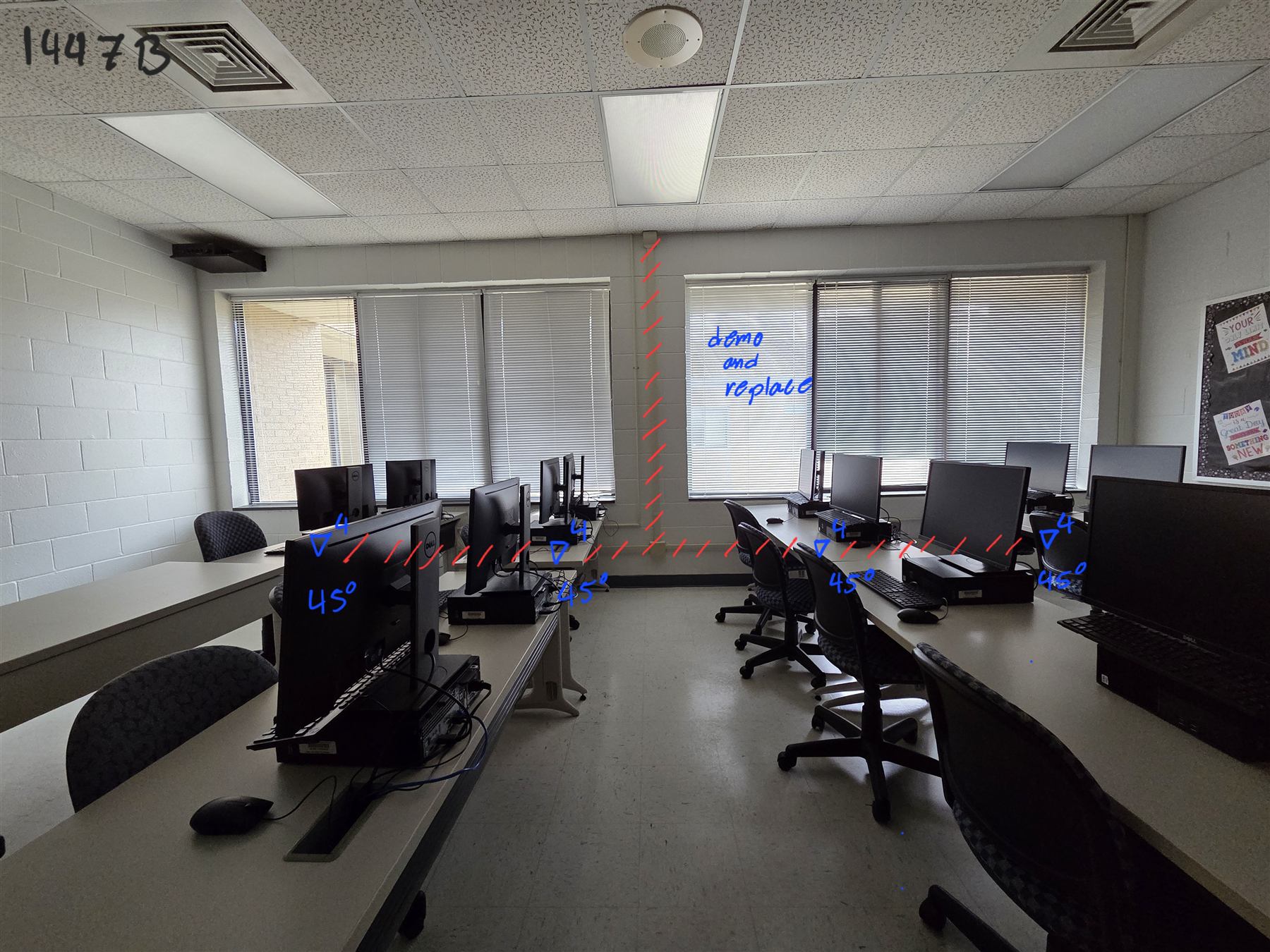 Computer lab marked up during a site survey with planned data drop locations